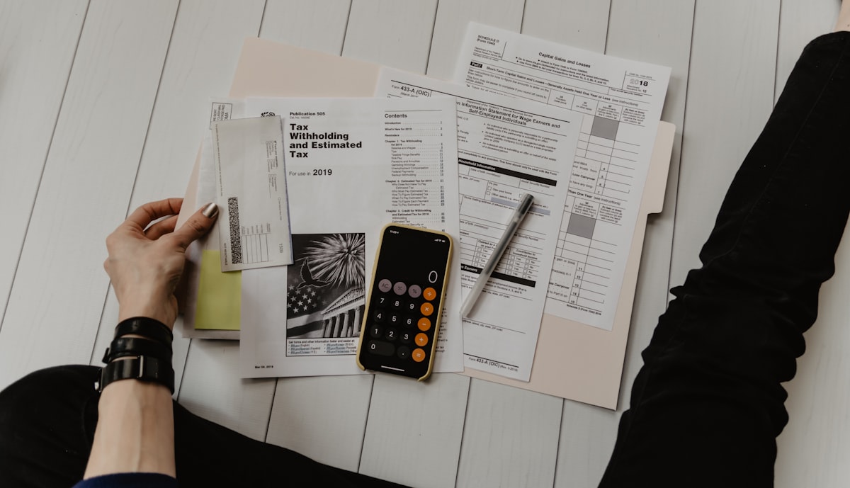 Single member LLC owner reviewing tax documents